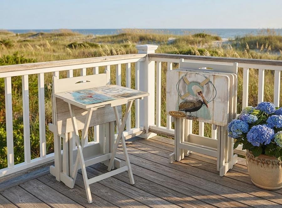 Coastal Bird Folding TV Tray Tables beside a sofa