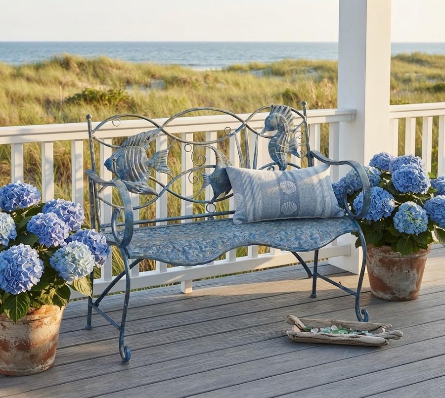 Blue Fish Coastal Outdoor Bench on a porch