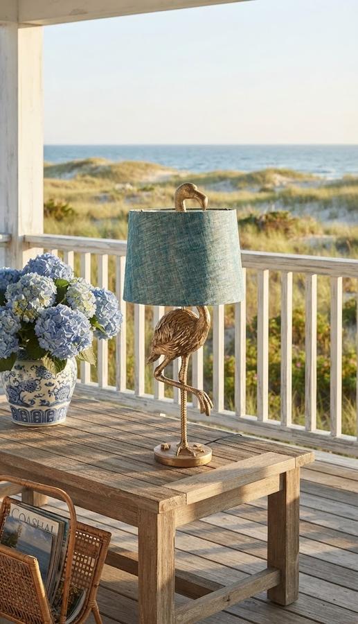 Flamingo table lamp with a blue shade on a console